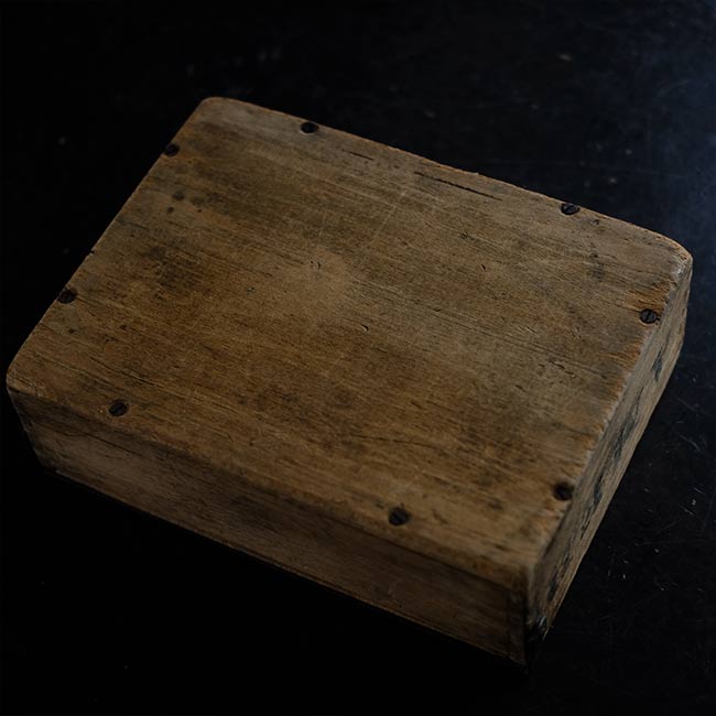 Wooden box with unusual fasteners