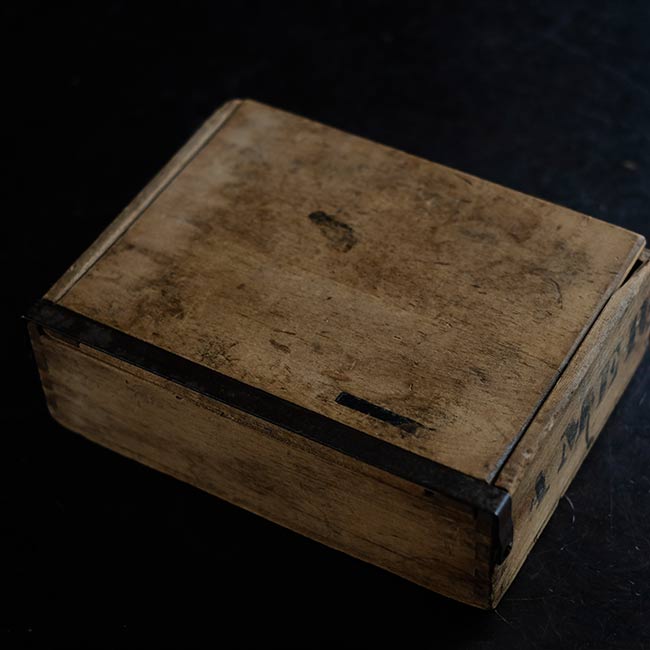 Wooden box with unusual fasteners