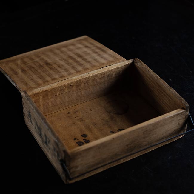 Wooden box with unusual fasteners