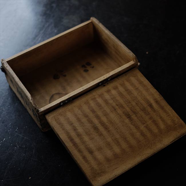 Wooden box with unusual fasteners