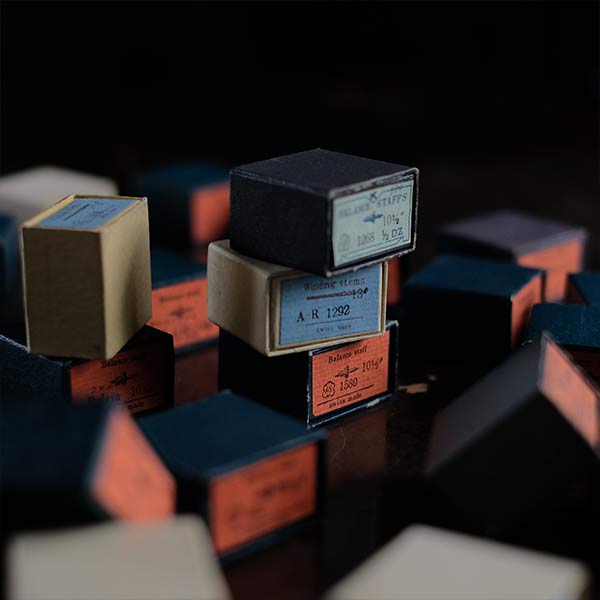 Paper box containing mechanical watch parts