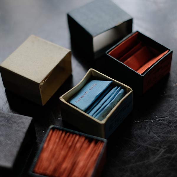 Paper box containing mechanical watch parts