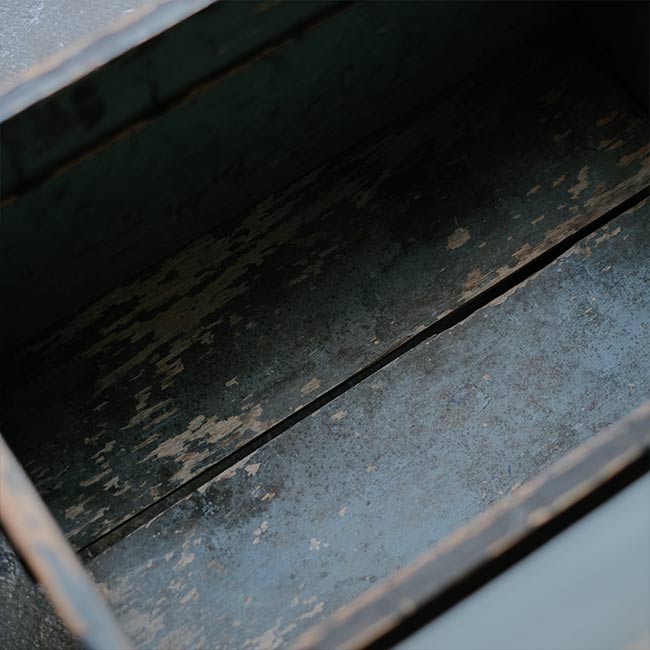 Wooden box with peeling paint