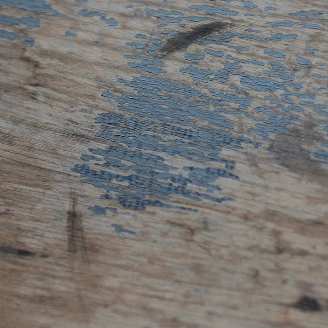 Wooden box with peeling paint