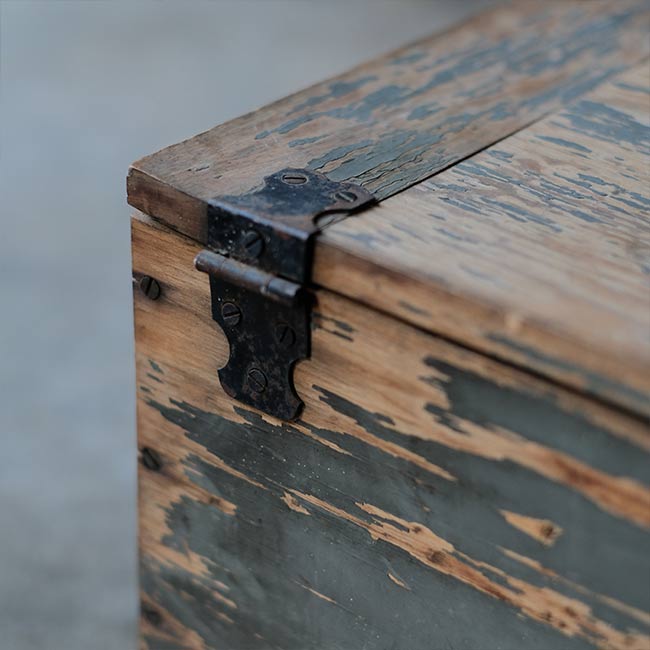 Wooden box with peeling paint