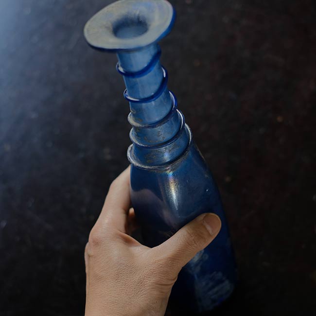 Silvered blue bottle