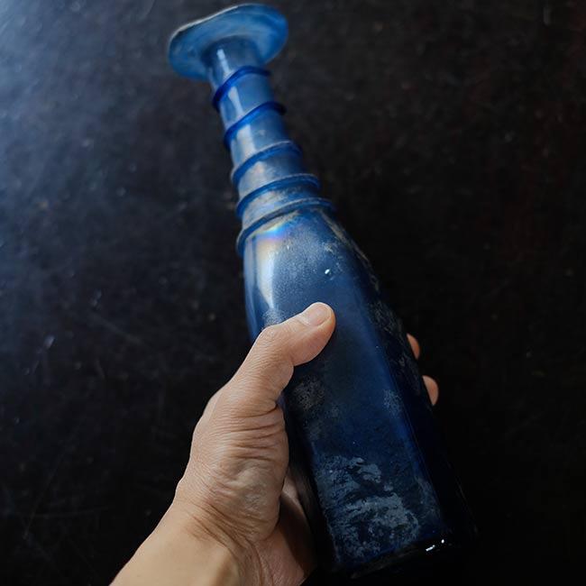 Silvered blue bottle