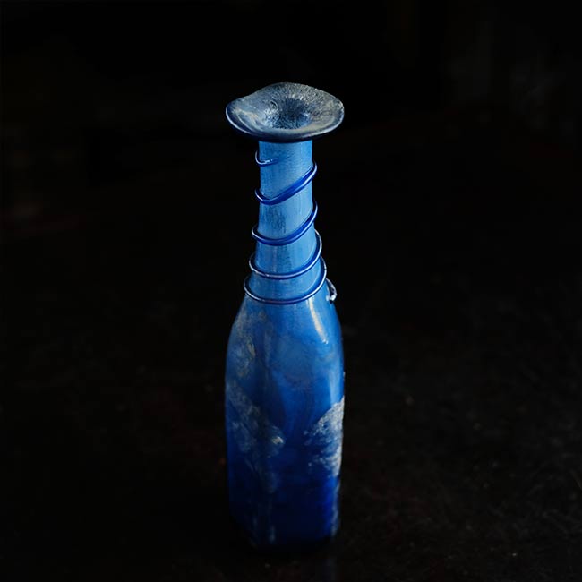 Silvered blue bottle