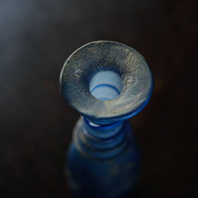 Silvered blue bottle