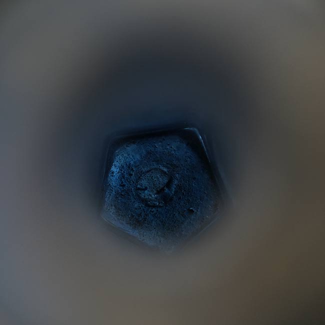 Silvered blue bottle