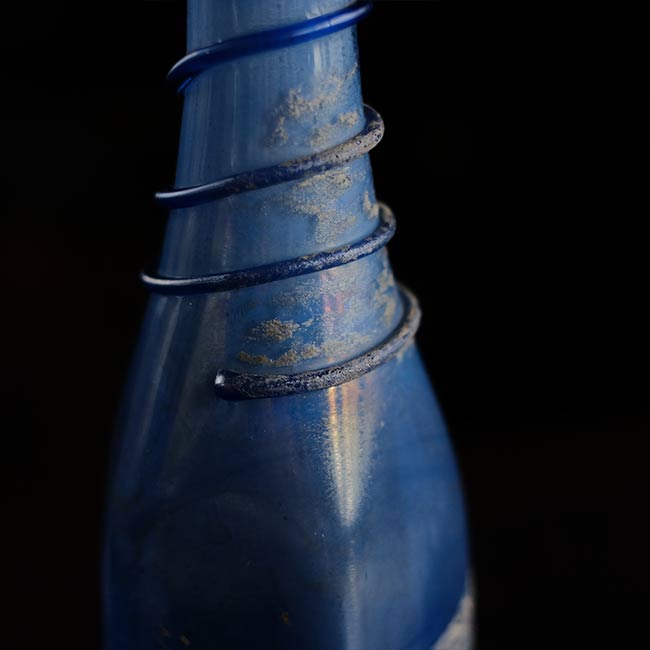 Silvered blue bottle
