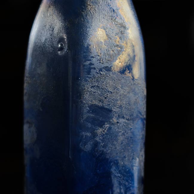 Silvered blue bottle