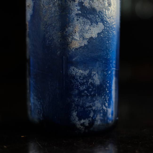 Silvered blue bottle