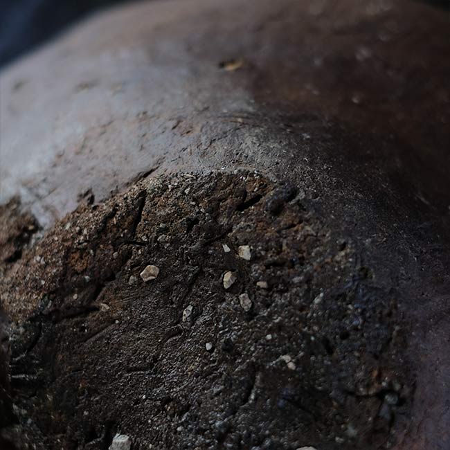 the bottom of a broken pot