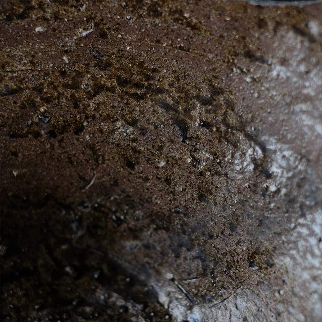 the bottom of a broken pot