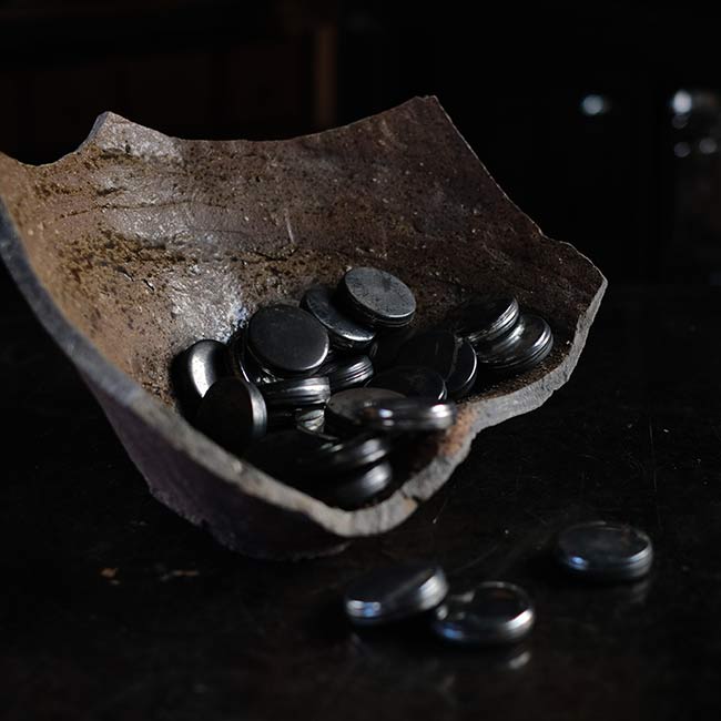 the bottom of a broken pot