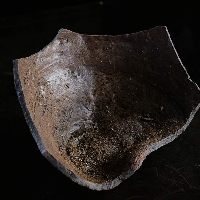 the bottom of a broken pot