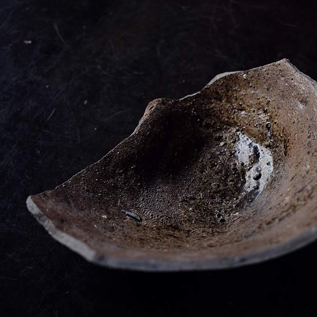 the bottom of a broken pot