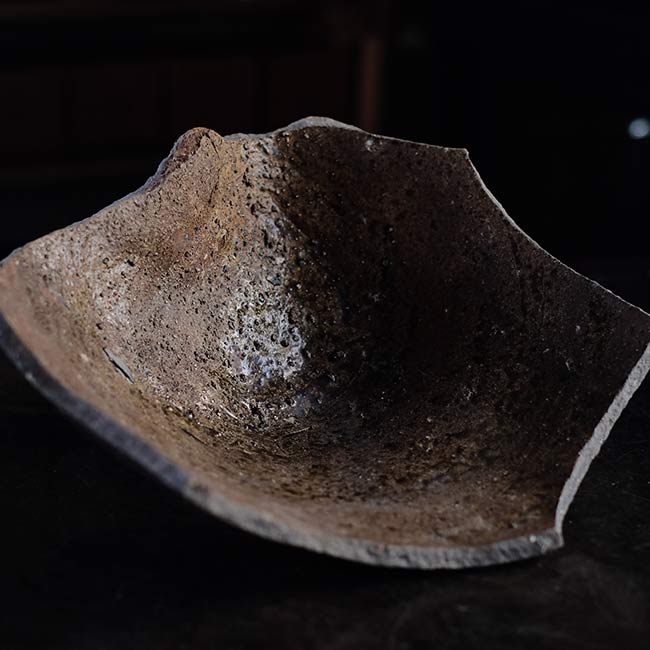 the bottom of a broken pot