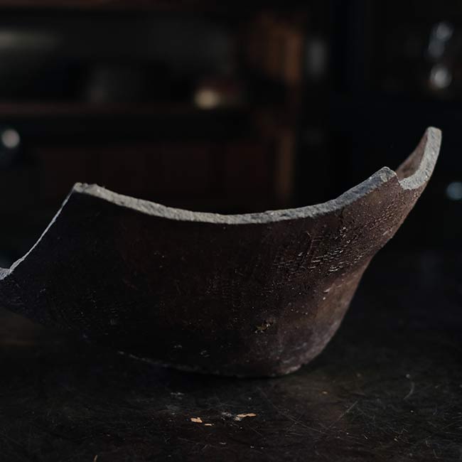 the bottom of a broken pot
