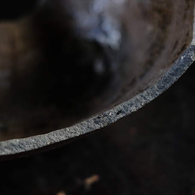 the bottom of a broken pot