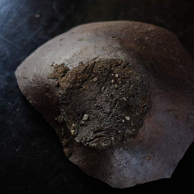 the bottom of a broken pot