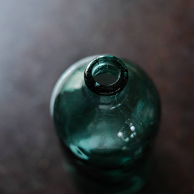 Aqua green medicine bottle