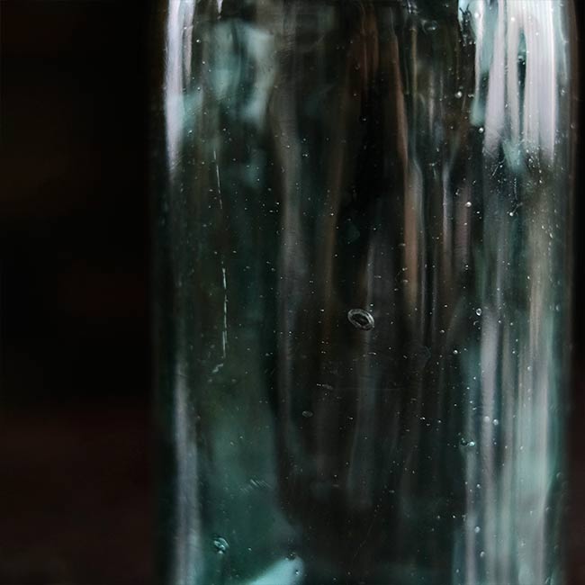 Aqua green medicine bottle