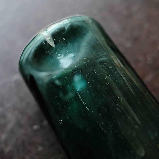 Aqua green medicine bottle