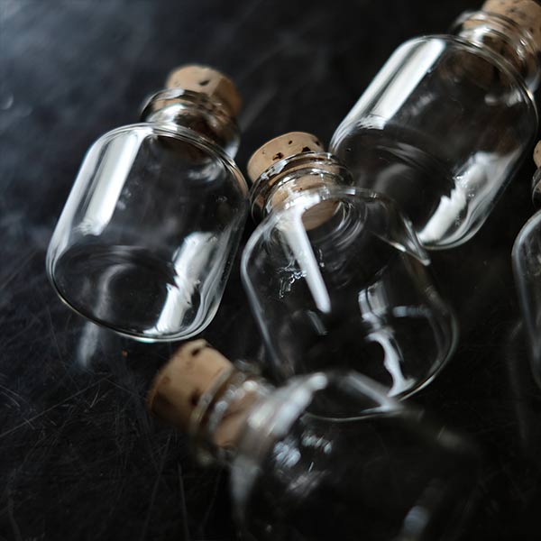 small bottle with cork