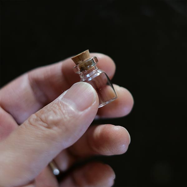 Extra small bottle with cork
