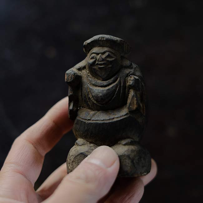 Wooden carving of Daikoku