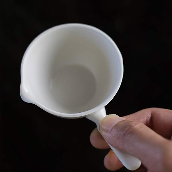Evaporating dish with handle