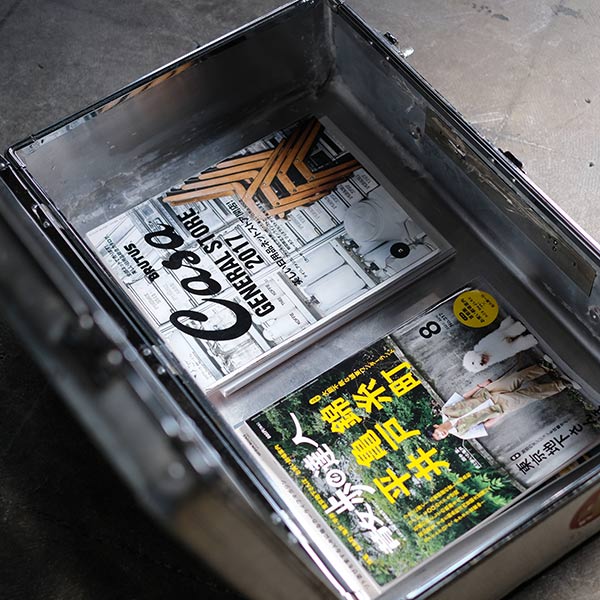 A well-worn aluminum trunk