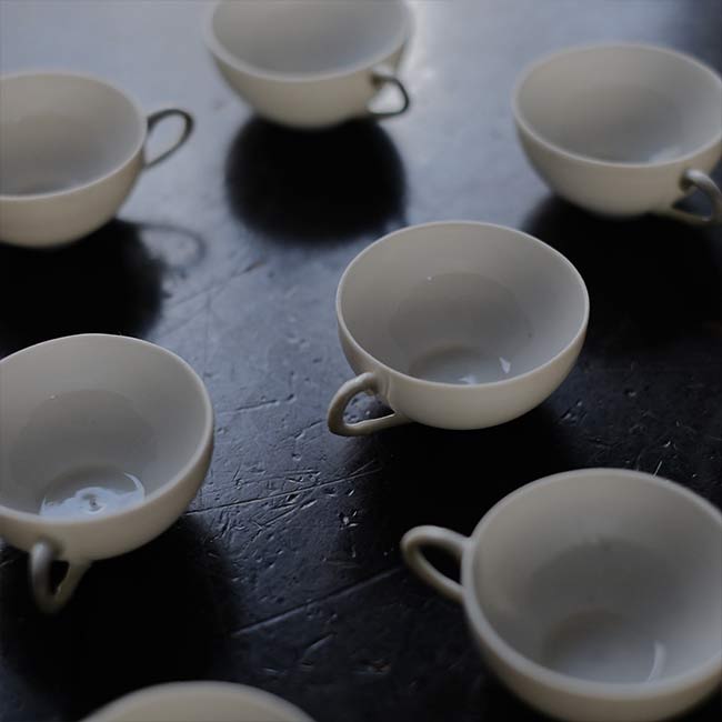 Small white porcelain cup