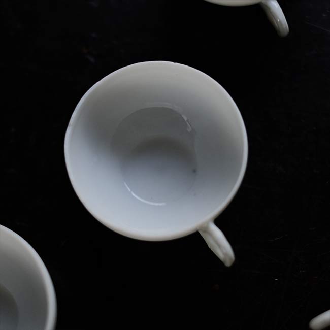 Small white porcelain cup