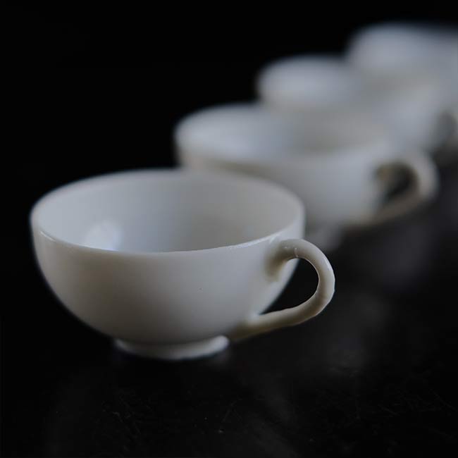 Small white porcelain cup