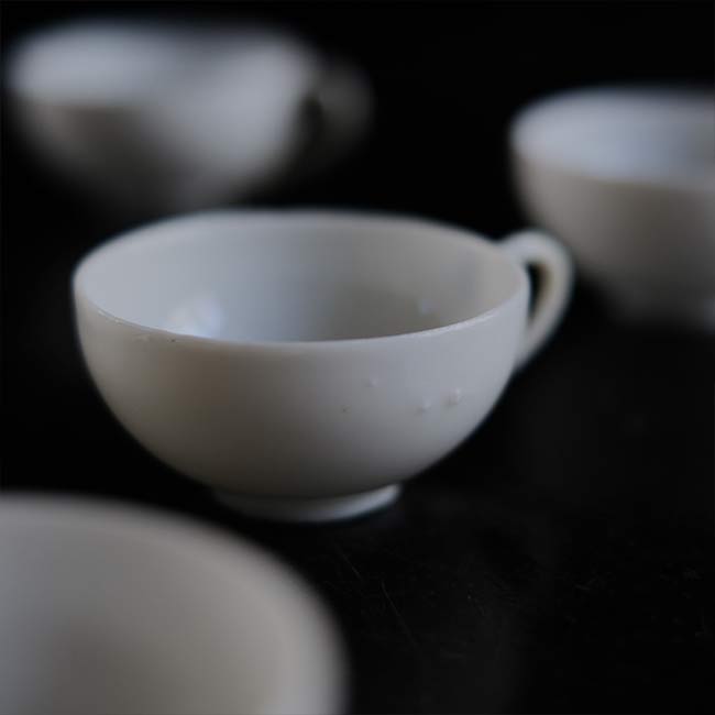 Small white porcelain cup