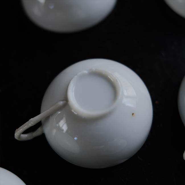 Small white porcelain cup