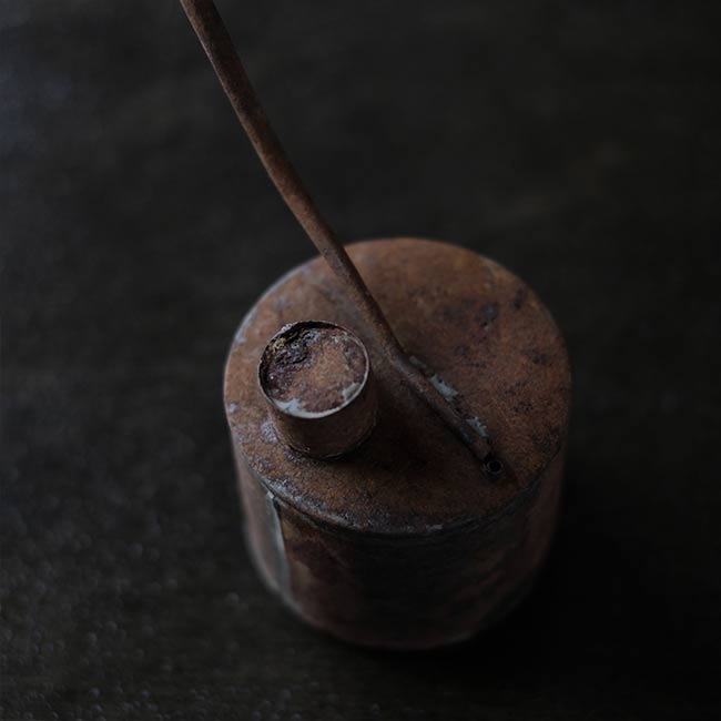 can with a funnel
