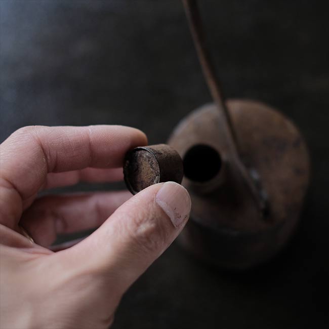 can with a funnel