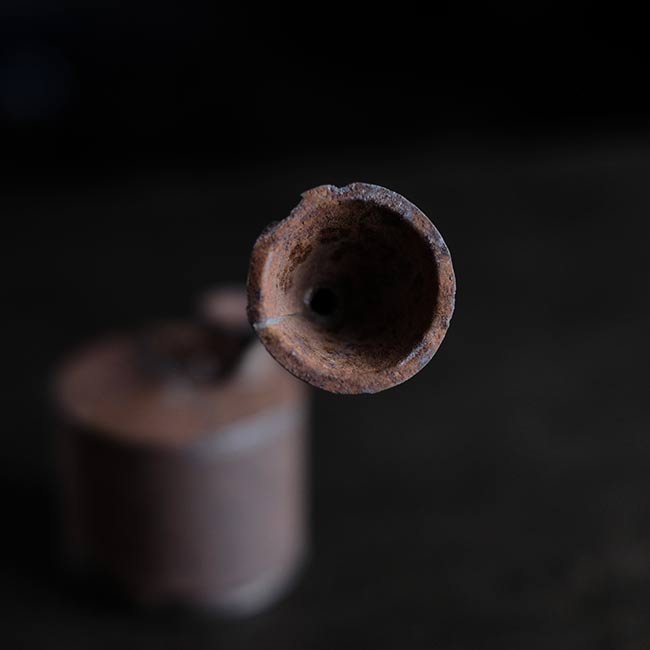 can with a funnel