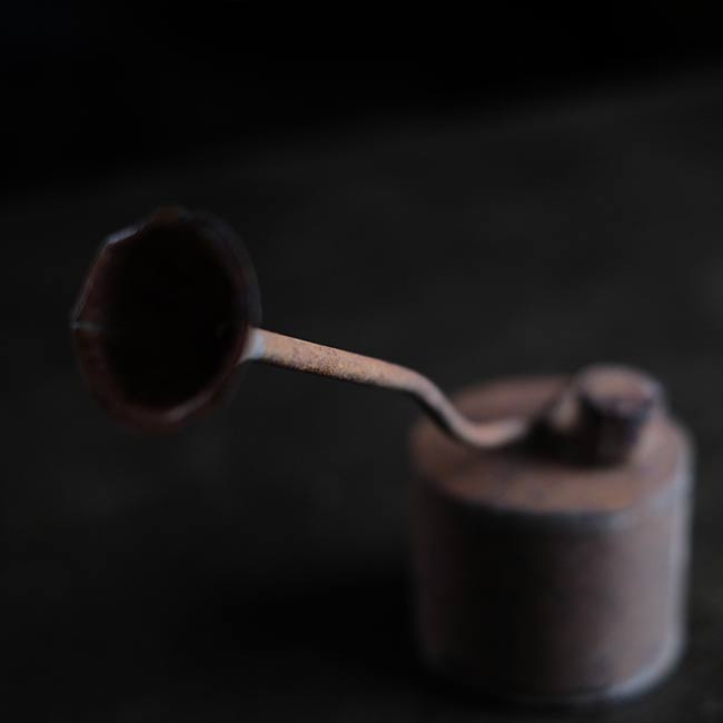 can with a funnel