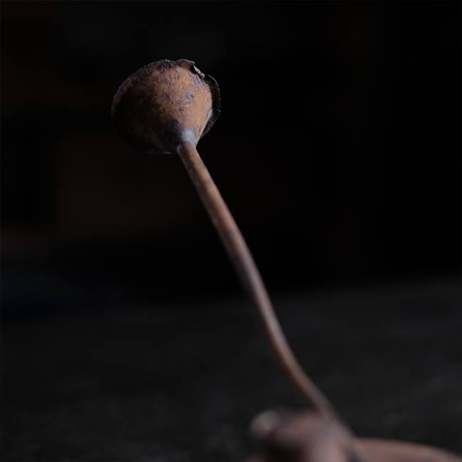 can with a funnel