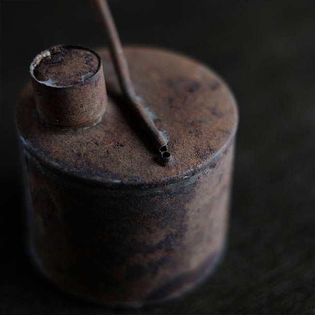 can with a funnel