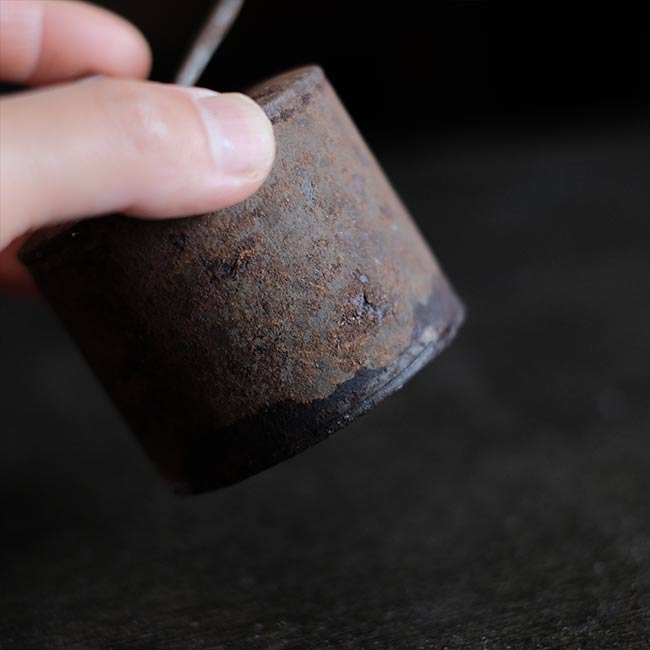 can with a funnel
