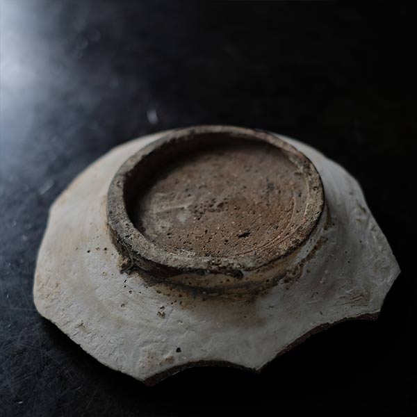 Remains of a fish-patterned bowl