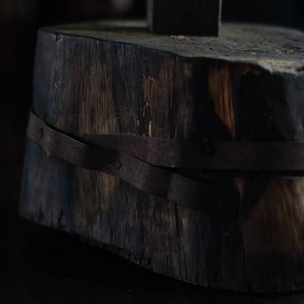 Anvil and wooden stand