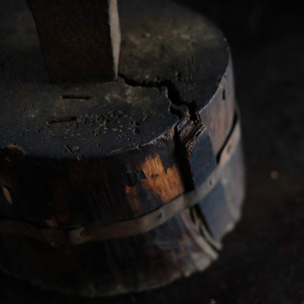 Anvil and wooden stand