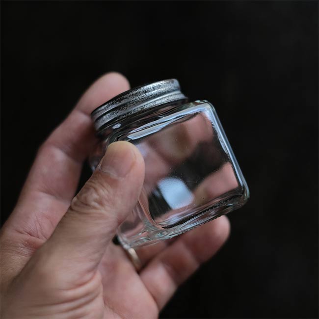 Small glass canisters (sold individually)